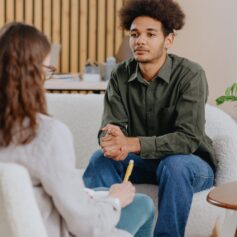 Young,Man,In,Consultation,With,Psychologist,Is,Taking,Care,Of Young,Man,In,Consultation,With,Psychologist,Is,Taking,Care,Of