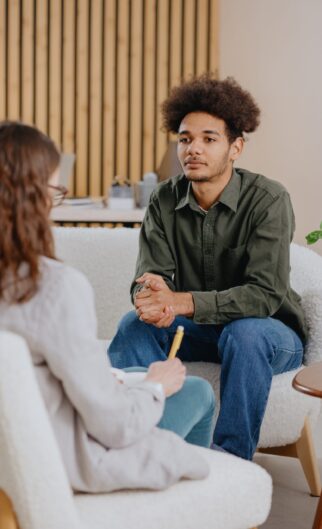 Young,Man,In,Consultation,With,Psychologist,Is,Taking,Care,Of Young,Man,In,Consultation,With,Psychologist,Is,Taking,Care,Of